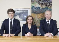 Picture of funerals organisation team at Feehily's. Links to contact page.